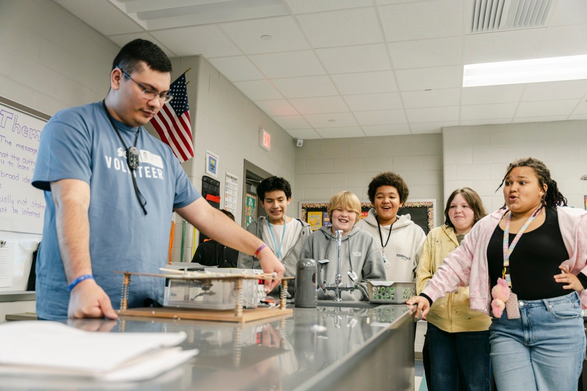 Highland Springs Middle School students watch intently as their carefully built structure succumbs to the forces of simulated seismic activity on the shake table.