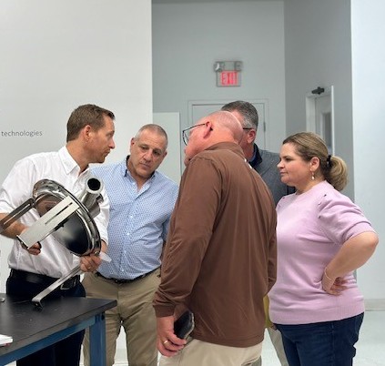 The SRNS STAV team perform a manufacturing facility review with a potential supplier who specializes in solvent system designs.