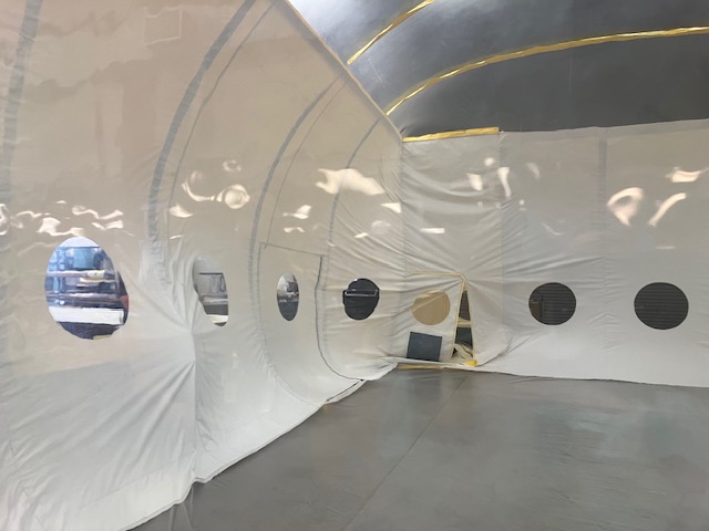 Inside the massive containment hut.