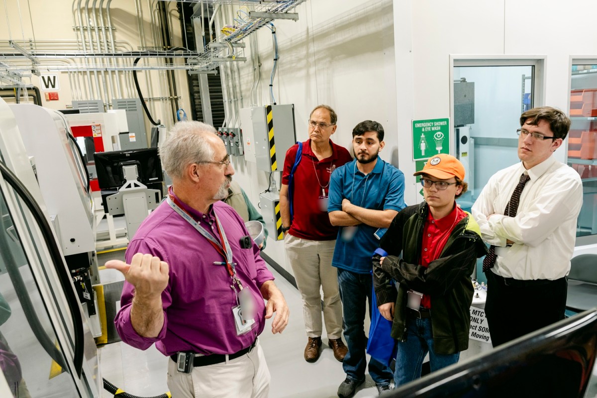 Ross Montgomery, SRPPF Deputy Facility Manager, shares information about a high-precision lathe in the MTC.