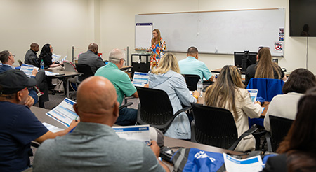 Lisa Tanner, SRNS Small Business Liaison Officer, presenting during a quarterly Mentor Protégé Center of Excellence meeting