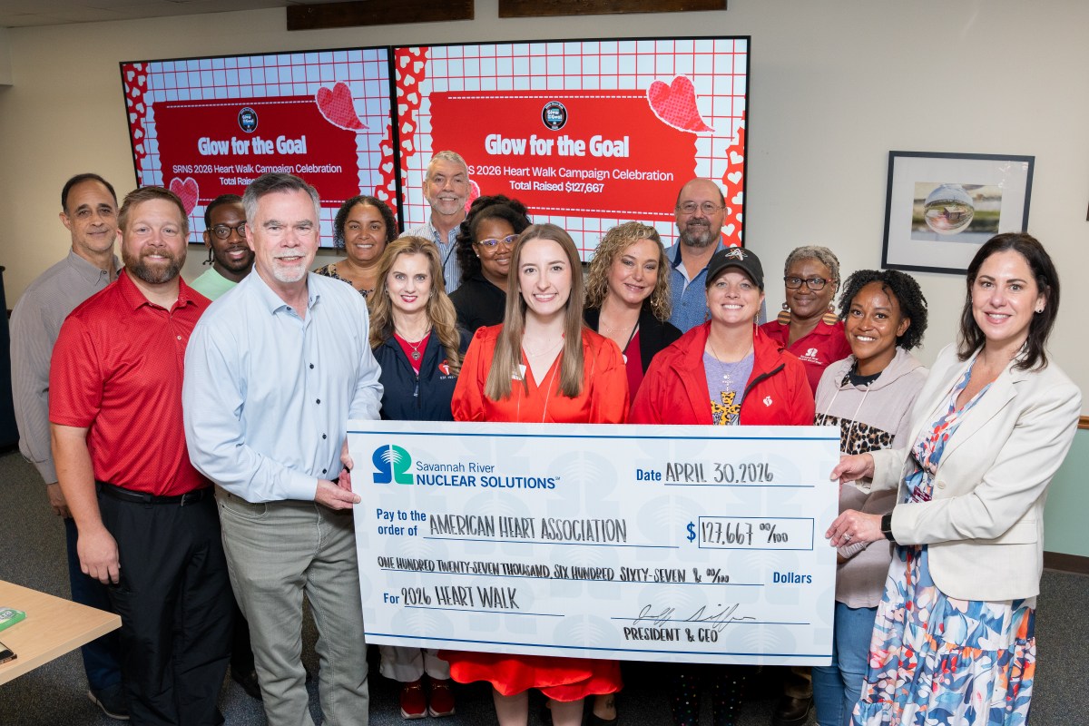 Savannah River Nuclear Solutions presents a check to the American Heart Association in recognition of a successful campaign.