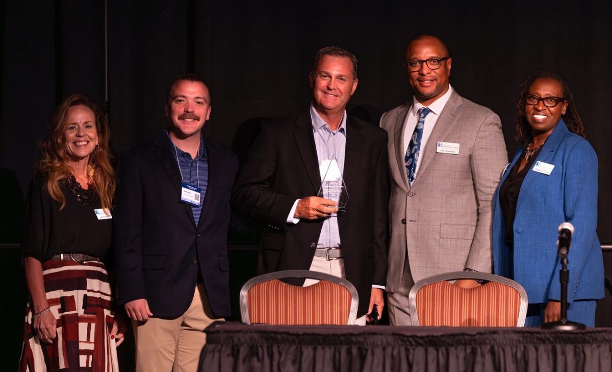 SRNS named Eastern Power Technologies “Woman-Owned Small Business of the Year” during the event. From left: Lisa Tanner, SRNS Director, Supplier Mission Readiness and Engagement; James Brock, Outside Sales Account Manager; Rod Turnage, Senior Director of Government Sales; Jay Johnson, SRNS Deputy Senior Vice President of Business Services and Chief Contracting Officer; and Deb Tyler, SRNS Manager, Supplier Mission Readiness and Engagement.